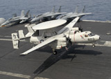 STK104472M
An E-2C Hawkeye lands on the flight deck of USS Theodore Roosevelt.