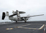 STK104648M
An E-2C Hawkeye launches off the flight deck of USS Abraham Lincoln.