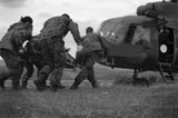 STK104724M
Multinational medical personnel race to a Macedonian MI-17 with a wounded patient.