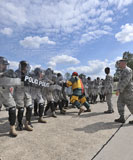 STK104788M
U.S. Air Force 86th Security Forces Squadron in a simulated riot control exercise.