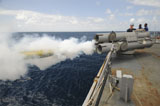 STK104812M
Sailors observe a MK-46 recoverable exercise torpedo launch aboard USS Mitscher.