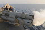 STK104927M
Seamen fire an air slug from a MK-32 surface vessel torpedo tube.