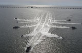 STK105194M
Members of the fleet survey team conducting formation exercises.