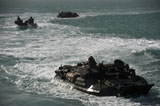 STK105266M
Amphibious assault vehicles transit the Arabian Gulf.