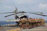 STK105327M
Marines and sailors run aboard USS Makin Island.
