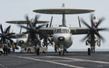 STK105576M
An E-2C Hawkeye aircraft on the flight deck of USS Carl Vinson.