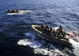 STK105578M
Sailors transit the Atlantic Ocean aboard rigid-hull inflatable boats.