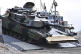 STK105603M
Marines off-load an armored tank from a lading craft air cushion.