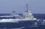 STK105661M
USS Carney practices diversion tactics with the German frigate Sachsen.