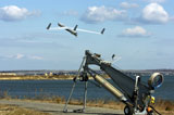 STK105677M
A ScanEagle unmanned aerial vehicle launches from a catapult.