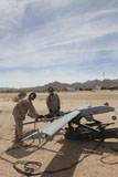 STK105749M
U.S. Marines prepare to start the engine of an RQ-7 Shadow.