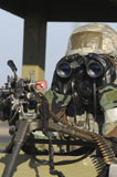 STK105777M
A soldier looks through binoculars from his outpost.