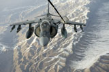 STK105809M
An A/V-8B Harrier receives fuel over Afghanistan from a KC-10 Extender.