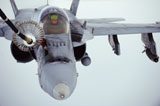 STK105815M
An F/A-18 Super Hornet receives fuel over Afghanistan.