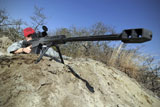 STK105837M
Airman sights a .50 caliber sniper rifle.