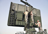 STK105841M
Soldiers set up a TPS-75 radar.