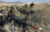 STK105954M
U.S. Air Force Pre-Ranger School students move up covertly into firing positions.