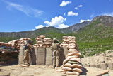 STK105969M
U.S. Army soldier and an Afghan security guard provide security.