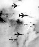 STK106007M
A B-66 Destroyer and F-105 Thunderchief aircraft bomb North Vietnam.