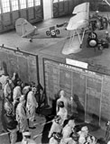 STK106008M
Aviation cadets check flight boards for last minute instructions.