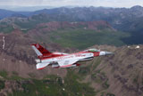 STK106041M
Minute Men paint scheme on an F-16 Fighting Falcon over Rocky Mountains.