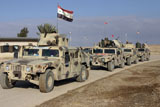 STK106109M
Iraqi Army soldiers aboard M1114 humvee vehicles.