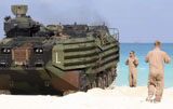 STK106125M
An amphibious assault vehicle is guided into the water.