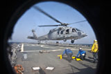 STK106434M
An MH-60S Sea Hawk takes off from the flight deck of USS Porter.