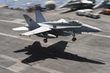 STK106473M
An F/A-18C Hornet lands aboard USS Dwight D. Eisenhower.
