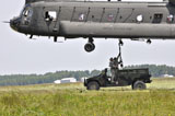 STK106584M
Soldiers teach students sling load operations on a CH-47 Chinook.