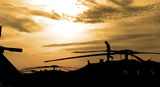 STK106604M
A pilot conducts a pre-flight inspection on a UH-60 Black Hawk helicopter.