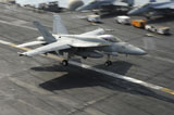 STK106646M
An F/A-18E Super Hornet lands aboard USS Dwight D. Eisenhower.