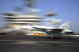 STK106682M
An F/A-18E Super Hornet lands aboard USS Dwight D. Eisenhower.
