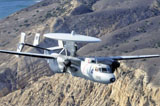 STK106698M
An E-2C Hawkeye aircraft flies over the Pacific Ocean.