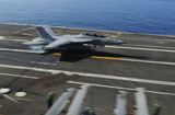 STK106719M
An F/A-18F Super Hornet makes an arrested landing aboard USS George H.W. Bush.
