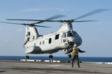 STK106748M
An aviation boatswain's mate directs a CH-46E Sea Knight.