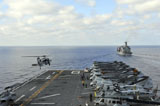 STK106792M
An MH-60S Sea Hawk takes off from the flight deck of USS Bonhomme Richard.