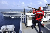 STK106829M
Airman fires a shot line from USS Bonhomme Richard.