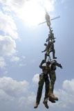 STK106965M
Explosive ordnance disposal technicians participate in spy rope training.