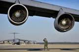 STK107024M
U.S. Air Force crew chief performs a post-flight inspection on a C-5 Galaxy.