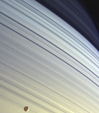 STK201208S
Mimas drifts along in its orbit against the azure backdrop of Saturn's northern latitudes.