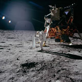 STK201245S
An astronaut deploying the Solar Wind Collector during an Apollo 11 moonwalk.