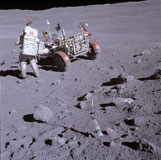 STK201249S
An astronaut and a lunar roving vehicle during an Apollo moonwalk.