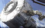 STK201260S
The Quest Airlock is maneuvered into the proper position to be mated onto the starboard side of Unity Node 1.