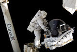STK201595S
An astronaut anchored to the foot restraint on the Canadarm2.