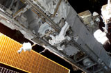 STK201624S
Astronaut traverses along the International Space Station.