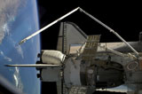 STK201782S
A Soyuz vehicle and the Space Shuttle Discovery docked to the International Space Station.
