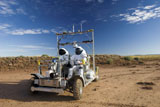 STK201835S
Two astronauts take a ride on SCOUT during Desert RATS activity in Arizona.