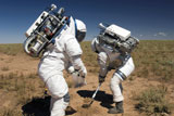 STK201836S
Two astronauts collect soil samples during Desert RATS activity in Arizona.