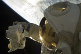 STK202613S
Cosmonaut photographs himself during a session of extravehicular activity.